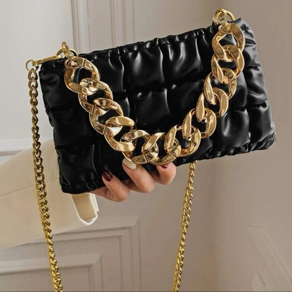 Black tufted handbag with chunky chain